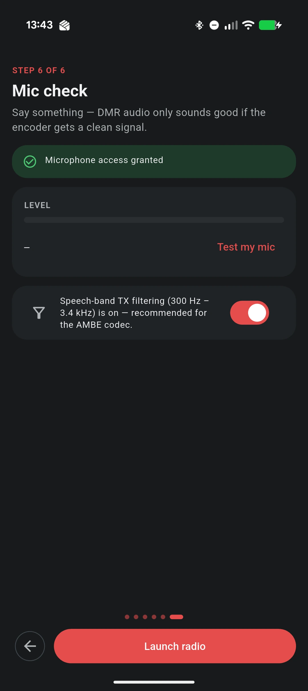 The "Mic check" step of the VoxDMR Android setup wizard: a green "Microphone access granted" banner, a LEVEL meter with a "Test my mic" button, and a row noting that speech-band TX filtering (300 Hz – 3.4 kHz) is on and recommended for the AMBE codec, toggled on