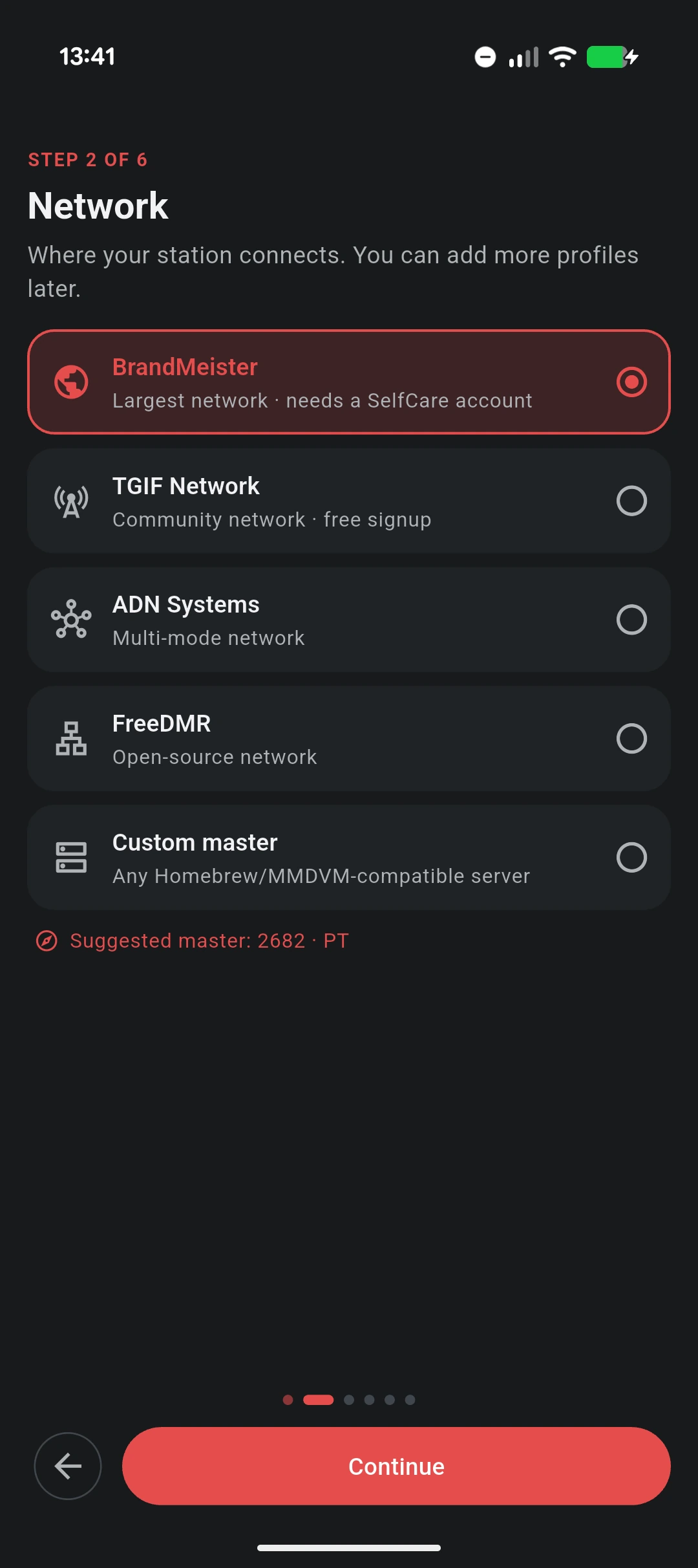 The "Network" step of the VoxDMR Android setup wizard: BrandMeister selected in red at the top of a list with TGIF Network, ADN Systems, FreeDMR and Custom master below it, each with a one-line description, and a "Suggested master: 2682 · PT" line underneath