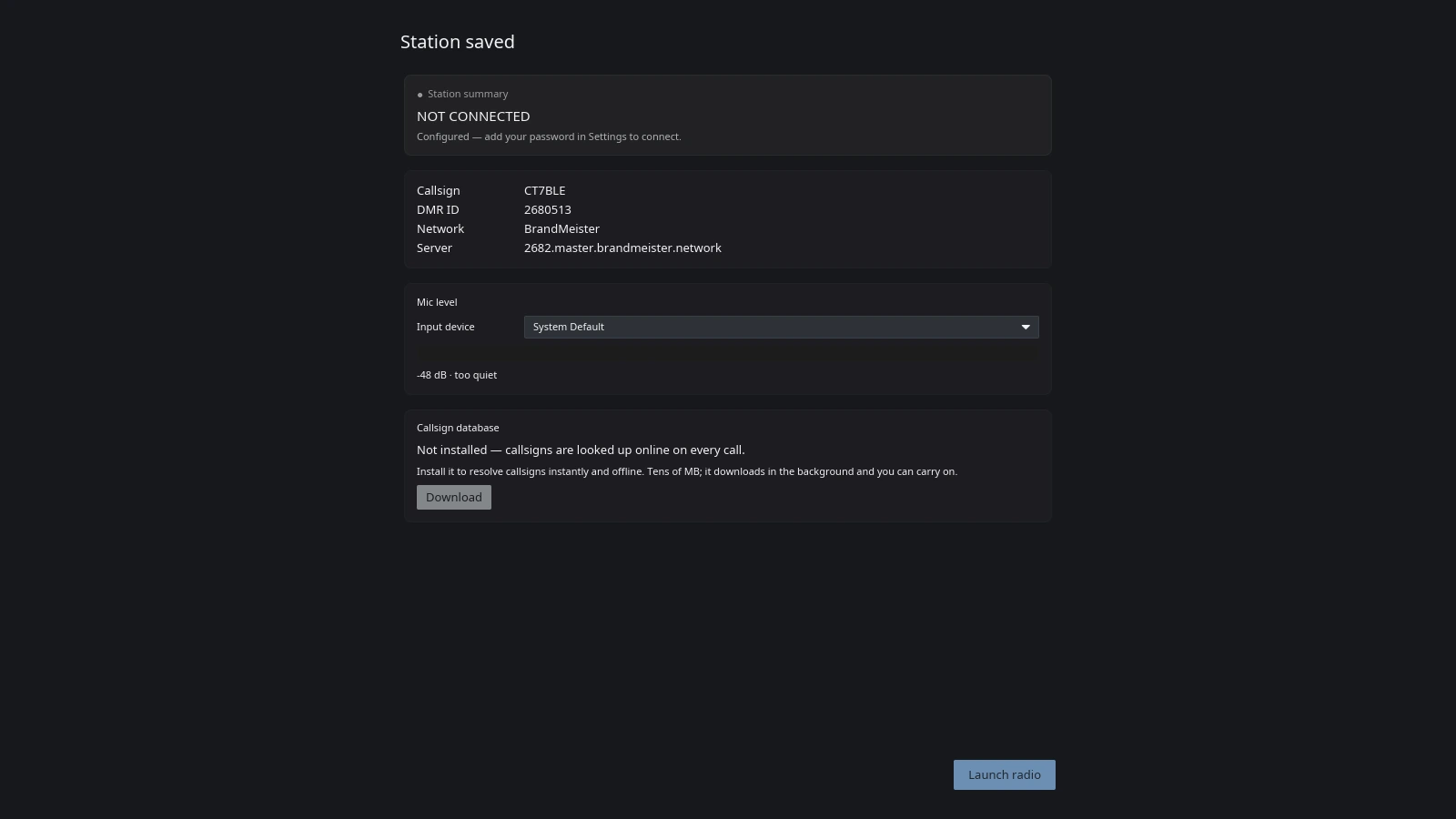 The final screen of the VoxDMR desktop setup wizard, headed "Station saved": a station summary card reading NOT CONNECTED with "Configured — add your password in Settings to connect", a details table listing CT7BLE, 2680513, BrandMeister and 2682.master.brandmeister.network, a Mic level strip with an Input device picker reading System Default and "-48 dB · too quiet", and a Callsign database offer
